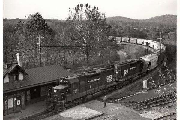 Photograph of SD35 6038 and SD40 6054 on a grain train coming off the Belt Line in Birdsboro PA. 10/22/76