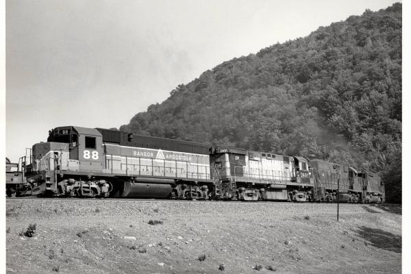 Photograph of C425 2491, GP38 7973, SD45 6155 and BAR GP38 88 on Horseshoe Curve. 5/27/77.
