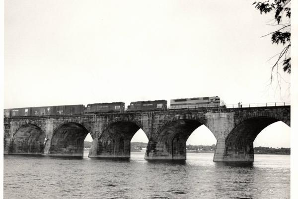 Photograph of SDP45 3645, a GP40 and SD45 6142 crossing Rockville Bridge. 5/76