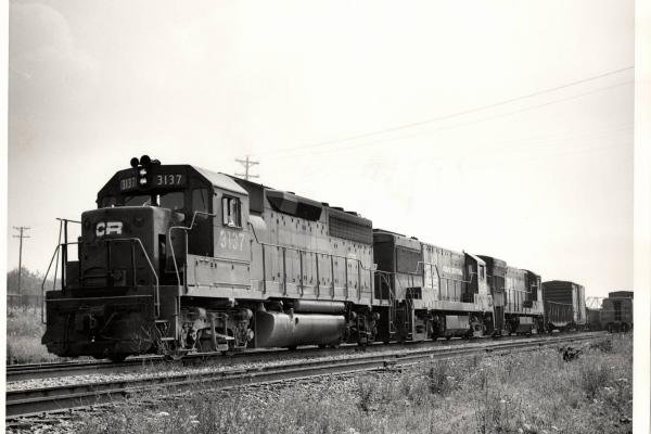 Photograph of GP40 3137, U25B 2626 and an unkniwn U23B at Orrville OH. 7/30/76