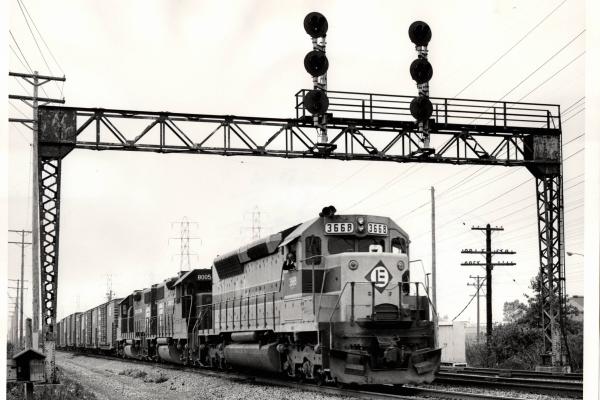 Photograph of SDP45 3668, GP38-2 8005 and another GP38-2 east of Cleveland OH. 7/31/76
