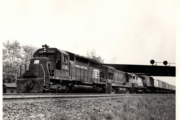 Photograph of SD40 6088, U23B 512 and C424 5250 westbound at Cresson PA. 6/76