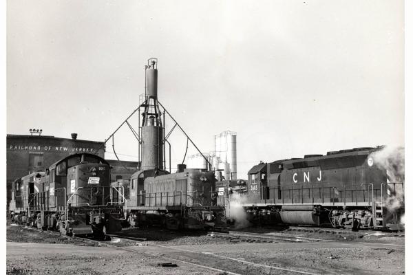 Photograph of RS1 9915, RS3 1563 and GP40P 3683 at E Port engine terminal. 12/5/76