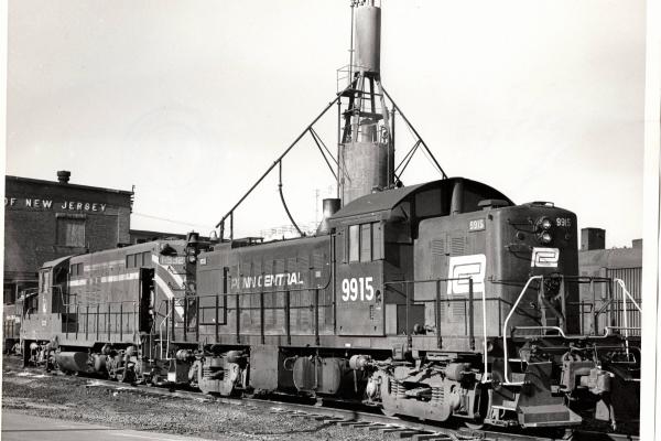 Photograph of RS1 9915 and GP9 1532 at E Port engine terminal. 12/5/76