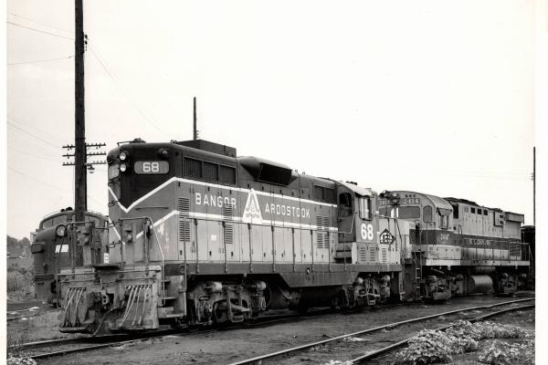 Photograph of BAR GP7 68 and C424 2414 at East 55th St Yard in Cleveland OH. 7/31/76