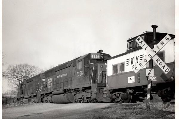 Photograph of SD45 6228 and another SD45 shoving a Western Maryland train at Hagerstown MD. 2/15/77