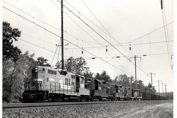 Photograph of GP9 7189, GP9 7238 and three more units on a Southbound Morgantown Turnaround coal train at Baltimore MD. 7/3/77