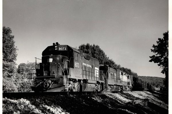 Photograph of GP38-2 8073, U23B 2754 and an unknown GP30 at Endicott NY. 9/27/76