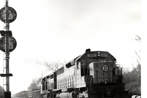 Photograph of SD45-2 3667 eastbound out of Reading with train HB-8. 10/22/76