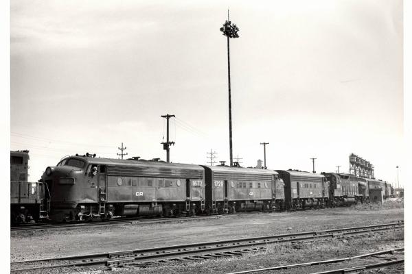 Photograph of F7 1677, F7 1729, F7 1855 and GP40 3243 at Collinwood Engine Terminal. 7/24/77