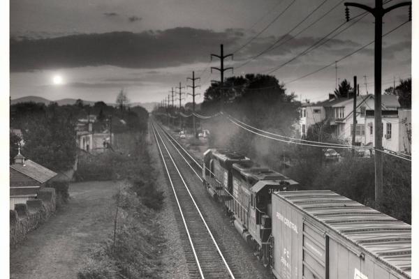Photograph of GP40 3164 and an unknown SD45 westbound out of Reading. 10/21/76