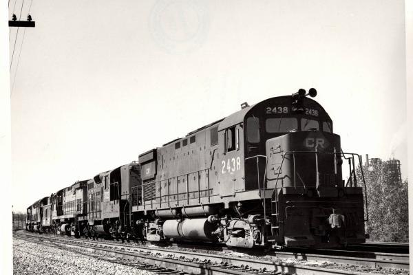 Photograph of C424 2438, GP9 7033 and more units entering Conway Yard. 5/16/77