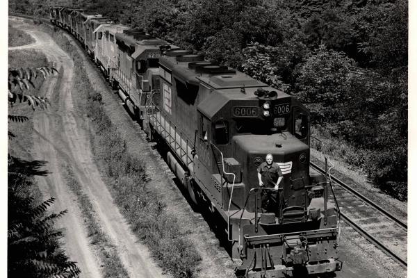 Photograph of SD35 6006, SD45 6219 and a number of other units entering Enola Yard. 7/76