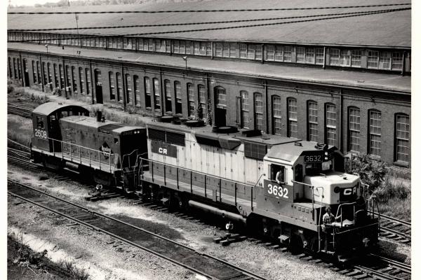 Photograph of GP35 6362 and SW1001 2608 at Rutherford Yard. 7/76
