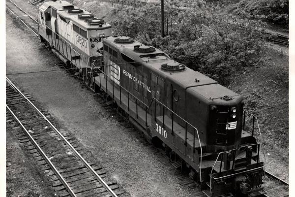 Photograph of GP9B 3810 and GP35 3620 at Rutherford PA. 5/76