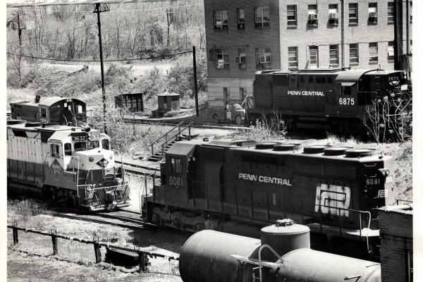 Photograph of SW1001 2604, GP35 3632, SD40 6081 and RSD12 6875 at Rutherford Yard. 4/25/76
