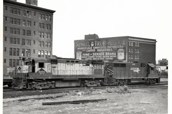 Photograph of C424 5209 and leased Missouri Pacific GP35 at Binghamton NY. 7/3/76