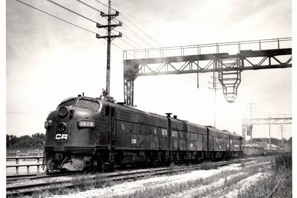 Photograph of F7 1878, F7B 3873 and two more F units on a freight out of Collinwood Yard in Cleveland OH. 7/25/76
