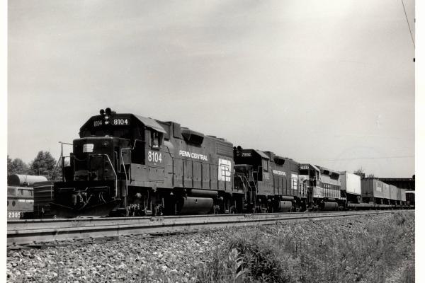 Photograph of GP38-2 8104, GP38-2 7992 and SDP45 3665 westbound at Cresson PA. 6/76