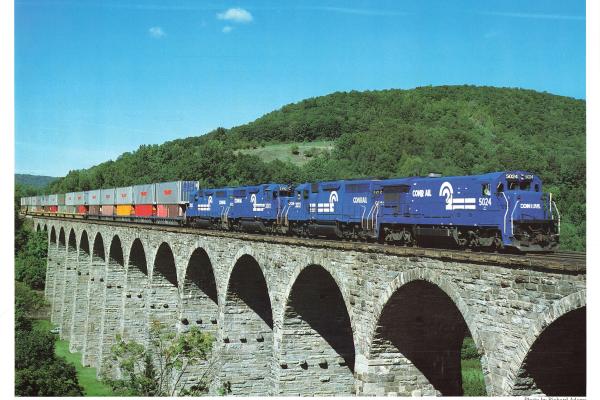 Promotional photo: Led by a B36-7, double-stack containers cross the Starrucca Viaduct near Lanesboro, Pa. The viaduct, built in 1848, is a National Historic Engineering Landmark.