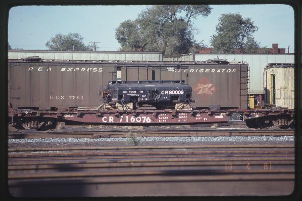 Scale Car 80009 on F41B Flatcar 716076 in Harrisburg, PA