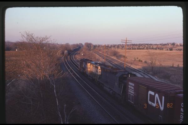 SD40-2 6438 Passing Wrecked RS3m 9904 in Hershey, PA