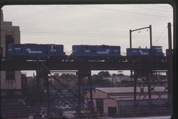 GP7s 5829 and 5837 with SW1500 9594 in Philadelphia, PA