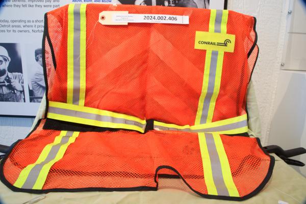 Safety Vests: Orange with yellow and silver reflective stripes - CR logo black on yellow patch
