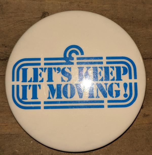 White Lets Keep It Moving! button