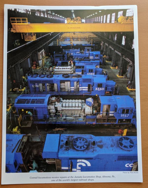 Promotional photo: Conrail locomotives receive repairs at the Juniata Locomotive Shop, Altoona PA., one of the world's largest railroad shops.