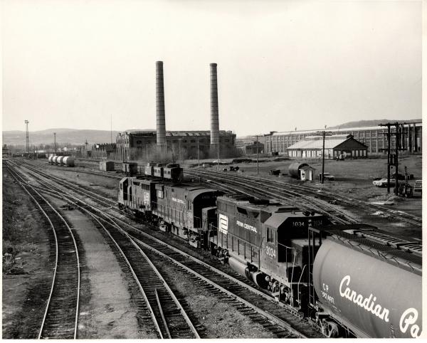 Photograph showing GP40 3034, C425 2450 and an unknown GP35 in Sayre PA.