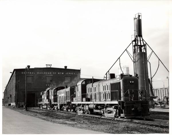 Photograph showing RS3 1542, S2 9739 and DL701 7626. Elizabethport NJ. 10/31/76.