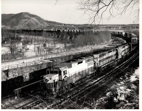 Photograph showing GP35 3650, SD45 6082 and SD45 3618 in Marysville PA. 12/3/76.
