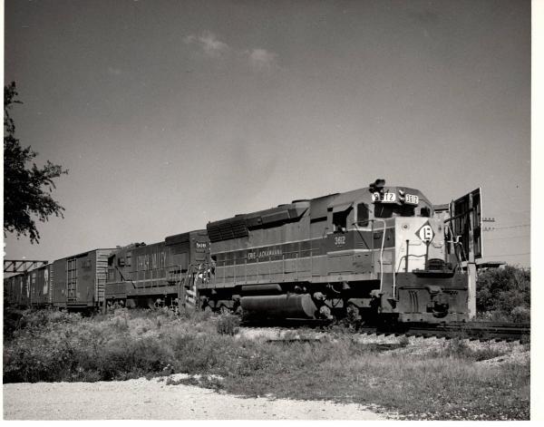 Photograph showing SD45 3612 and U23B 508 eastbound at Elkhart Indiana. 8/29/76.