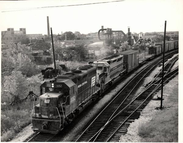 Photograph showing GP40 3052 and SDP45 3666 at Blue Island IL. 8/31/76.