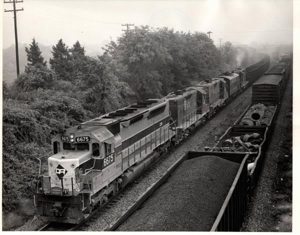 Photograph showing SDP45 6675 and multiple B&O and WM units at Rutherford PA.  9/26/76.