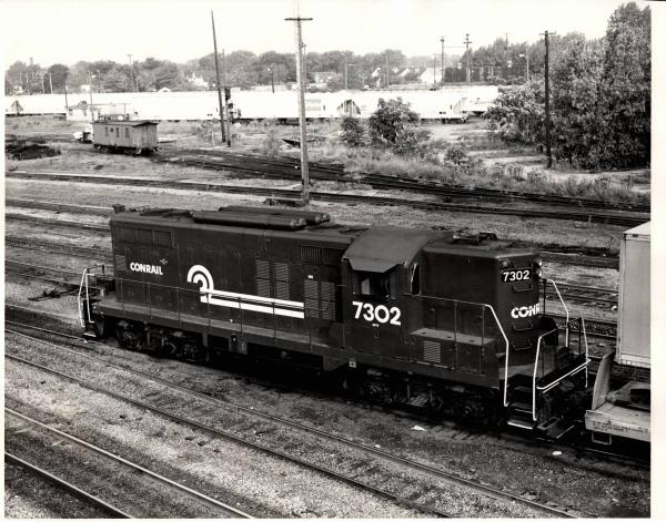 Photograph showing GP9 7302 at Collinwood Yard. 8/28/76