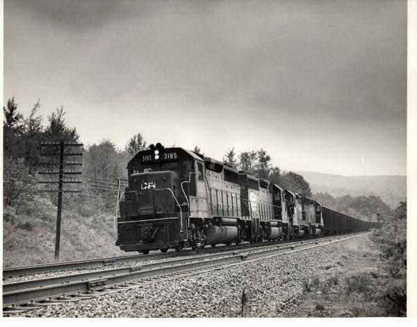 Photograph showing GP40 3185 leading a coal train at Scranton PA. 9/26/76