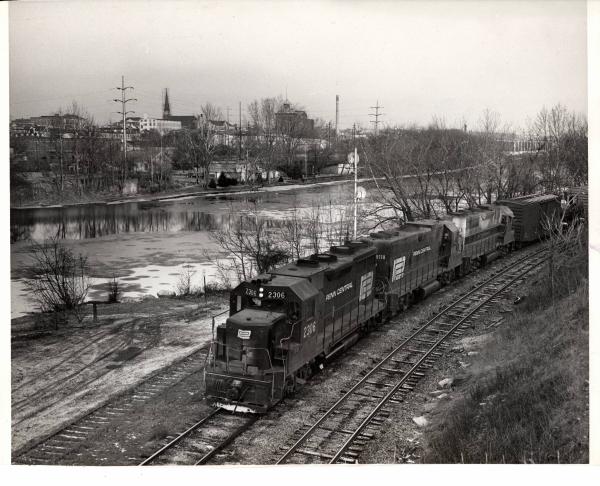 Photograph of GP35 2306, GP38-2 8118 and a former EL GP35 on BJ4 in Allentown PA. 12/5/76