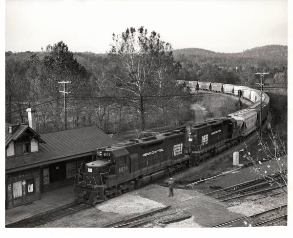 Photograph of SD35 6038 and SD40 6054 on a grain train coming off the Belt Line in Birdsboro PA. 10/22/76