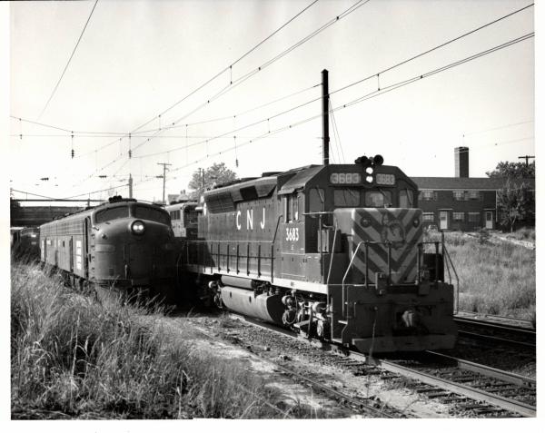 Photograph of GP40P 3683 and E8 4267 at South Amboy NJ. 7/15/77