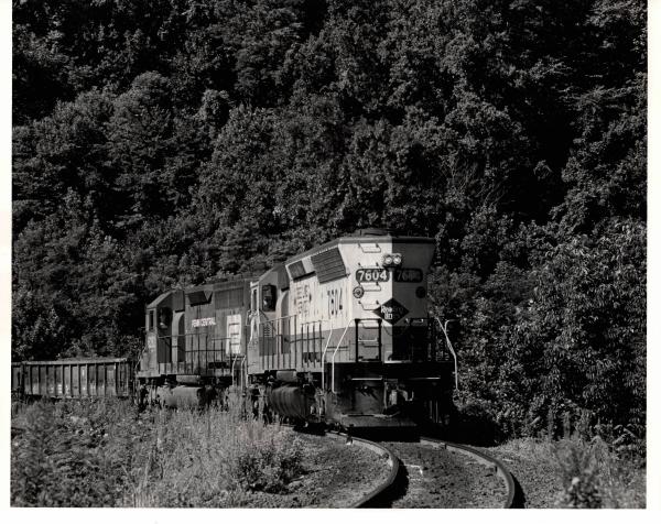 Photograph of SD45 7604 and SD40 6282 at Rockville Bridge. 7/76