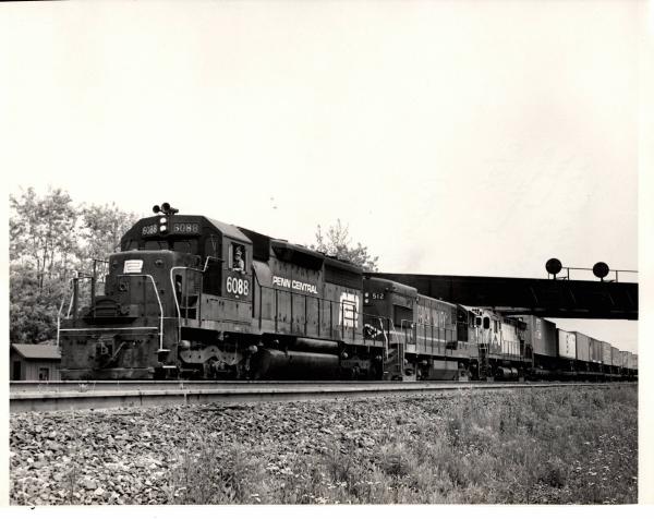 Photograph of SD40 6088, U23B 512 and C424 5250 westbound at Cresson PA. 6/76