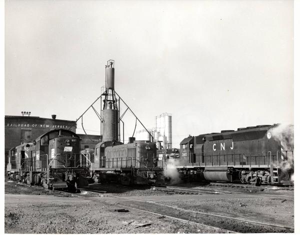 Photograph of RS1 9915, RS3 1563 and GP40P 3683 at E Port engine terminal. 12/5/76