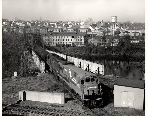 Photograph of U33C 6555 and an SD45 on train HB-8 The Star crossing the Reading Bridge on its way to Saucon Yard in Bethlehem PA. 11/26/76