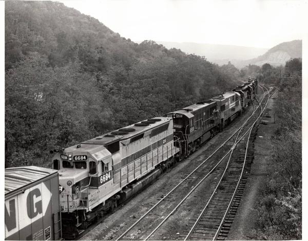 Photograph of SDP45 6684, U25C 6508 and many others at Enola Yard. 10/16/76