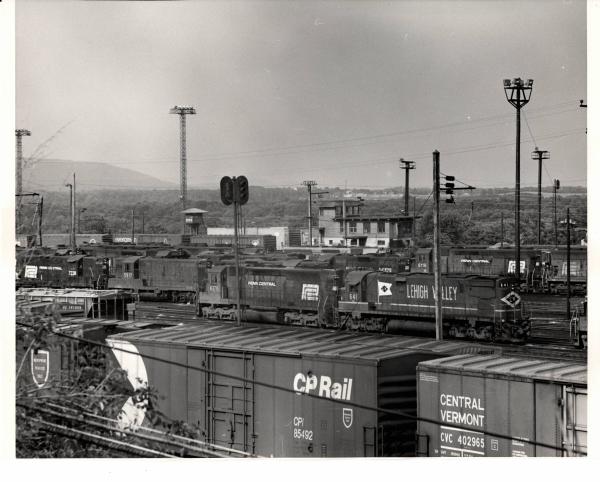 Photograph of GP9 7238, GP7 5917, SD45 6178, C628 641, SD45 6119 and many others in Conway Yard. 7/30/76.