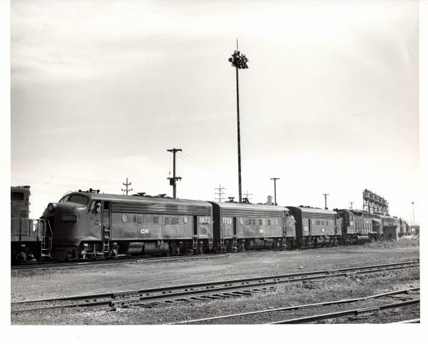 Photograph of F7 1677, F7 1729, F7 1855 and GP40 3243 at Collinwood Engine Terminal. 7/24/77