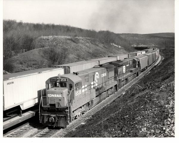 Photograph of U30C 6538 and U33C 6563 at Gallitzin. 2/17/77
