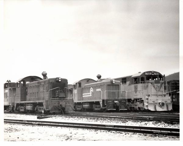 Photograph of SW8 261, SW8 8253 and D&H U33C 755 at Allentown Yard. 12/4/76